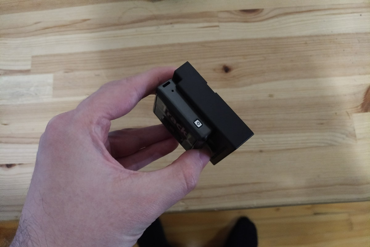 The Tracki GPS with its battery extender